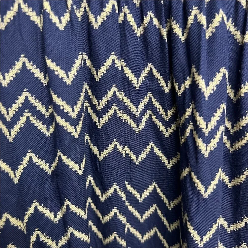 Holding Horses Anthropologie Navy and tan graphic print long sleeve dress